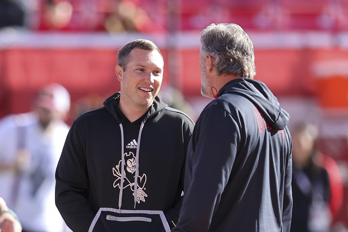 Nov 4, 2023; Salt Lake City, Utah, USA; Arizona State Sun Devils head coach Kenny Dillingham speaks with Utah Utes head coach Kyle Whittingham before a game at Rice-Eccles Stadium. Mandatory Credit: Rob Gray-USA TODAY Sports